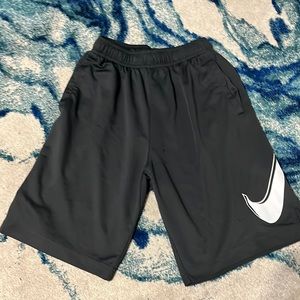 Grey Nike shorts size youth XL.